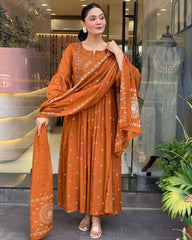 Gulnaar Mor: Orange Anarkali Set with Peacock Embroidery & Gota Detailing